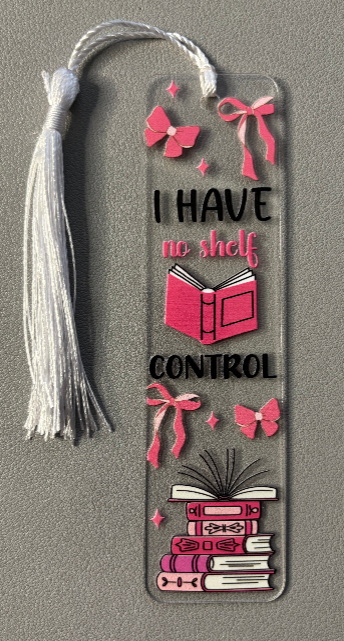 Decorative bookmark with text saying i have no shelf control and ribbons on a gray background