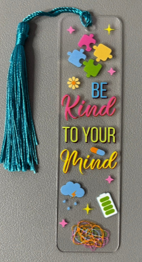 Decorative bookmark with colorful images and 'Be Kind To Your Mind' text on a gray background
