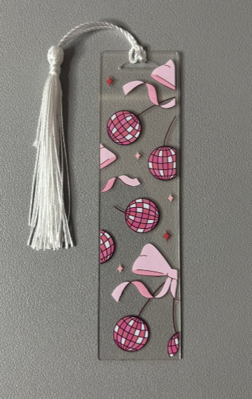 Decorative bookmark with pink and red patterns on a gray background