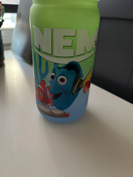 Finding Nemo Illustrations on a green and blue ombre plastic tumbler cup