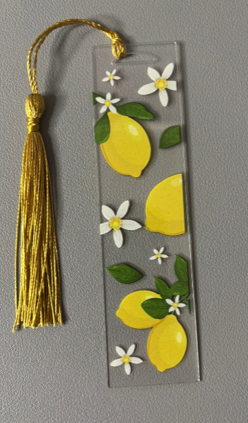 Decorative bookmark with lemons and flowers on a gray background