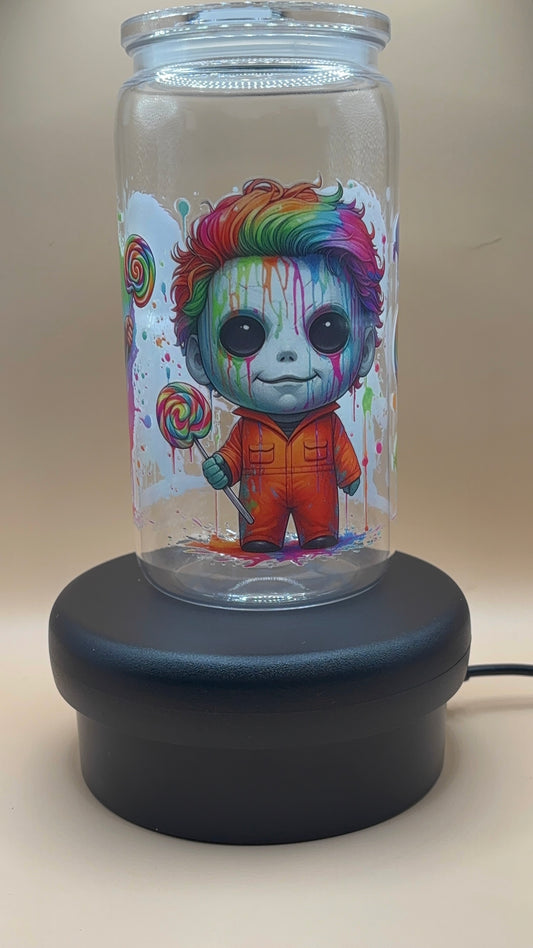 Clear plastic tumbler with a colorful michael myers design 