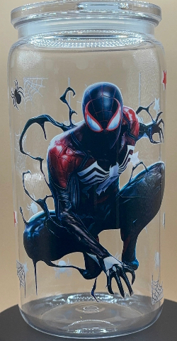 Plastic tumbler with Spider-Man design on a beige background